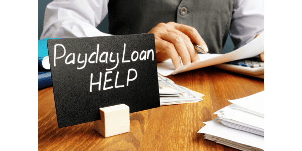 $255 payday loans help banner on the desk of business man